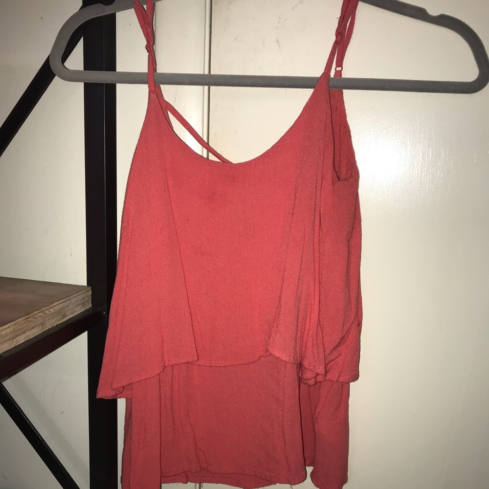 Coral colored sleeveless shirt